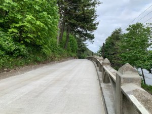 The viaduct on the Historic Highway after repairs/renovations, trees line the side of the roadway